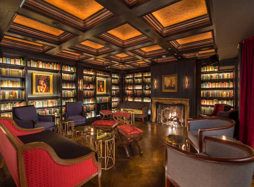 Library Bar at Yvonne's: elegant meeting space with plush seating for networking events.