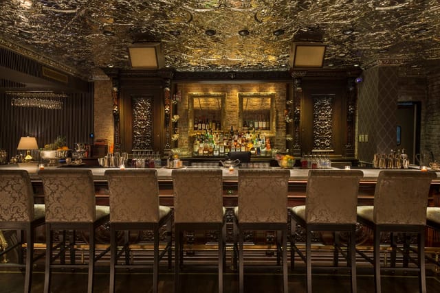 Sophisticated bar lounge with elegant decor for networking events and cocktail receptions.