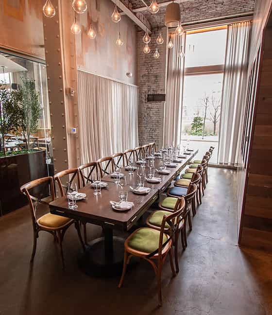 Private dining room with elegant table, ideal for intimate gatherings and corporate events.