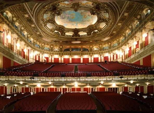 Grand theater interior with ornate architecture, ideal for events and performances.