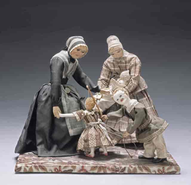 Dolls display at Peabody Essex Museum for nostalgic childhood-themed event.