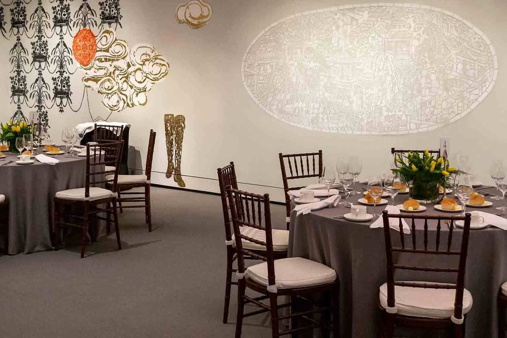 Morse Auditorium dining setup with gray linens for elegant events and formal dinners.