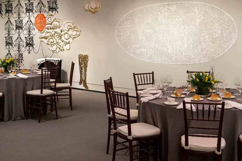 Morse Auditorium dining setup with gray linens for elegant events and formal dinners.