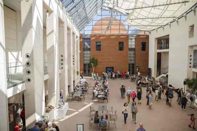 Atrium Spine at Peabody Essex Museum, spacious event space with a glass ceiling.