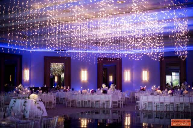 Elegant ballroom with fairy lights, perfect for weddings and upscale events.