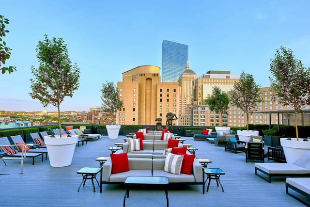 Stylish rooftop venue at Tea Gallery, Revere Hotel, ideal for events with city skyline views.