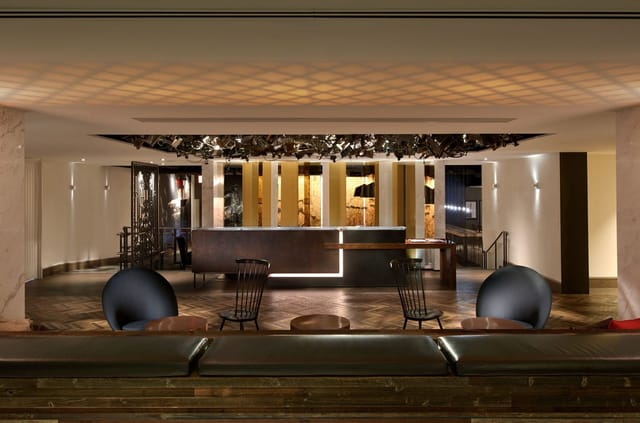 Modern lobby at Tea Gallery, Revere Hotel Boston Common, ideal for networking events.