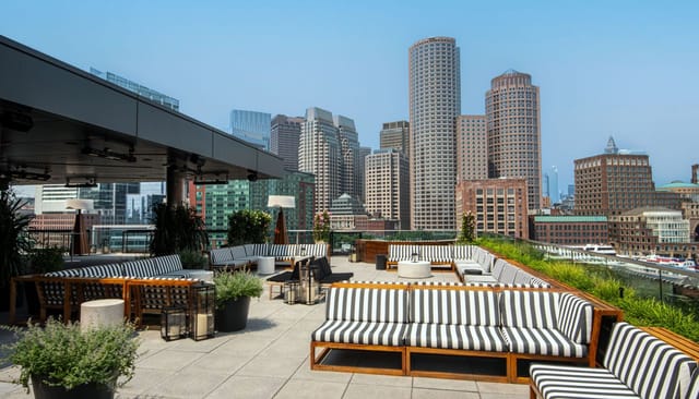 Stylish rooftop bar at The Envoy Hotel, perfect for upscale cocktail parties and receptions.