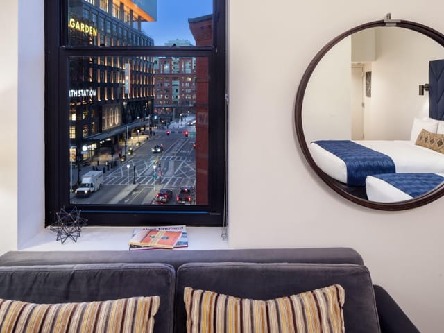 Stylish conference room with city view at Hotel Indigo Boston Garden, perfect for events.