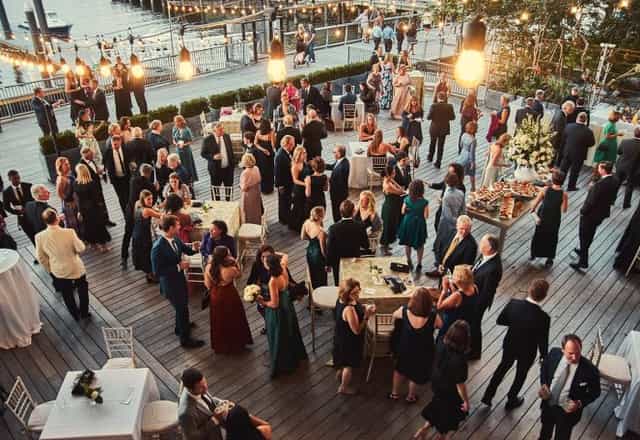 Putnam Investments Plaza gala with elegant lighting and guests enjoying a formal reception.