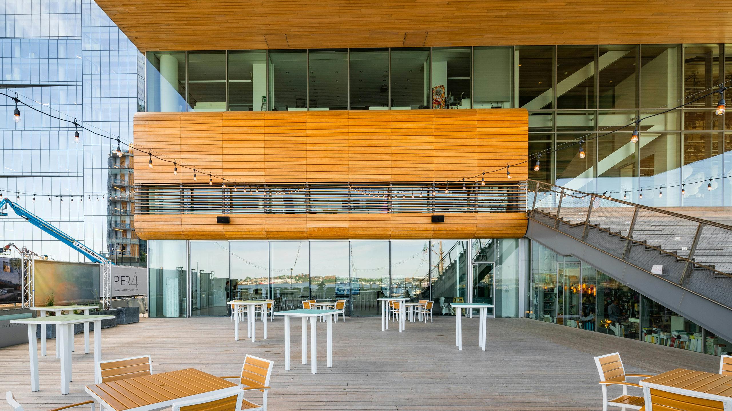 Modern outdoor event space with sleek wooden architecture at ICA Boston. Ideal for gatherings.