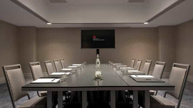 Modern conference room in Boston Marriott Cambridge with sleek table for professional meetings.