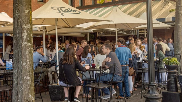 Waterfront patio in Tias, lively outdoor dining for casual meetings and events.