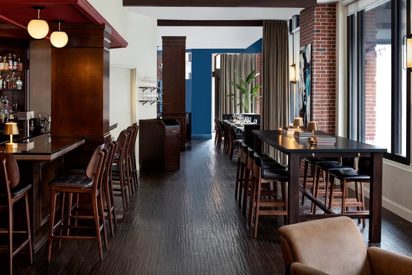 Modern event space at The Boxer Hotel with sleek bar, ideal for networking and meetings.