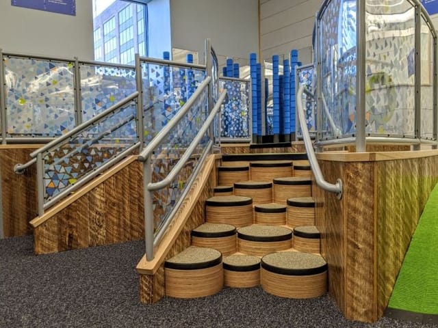 Vibrant multi-level Play Space at Boston Children's Museum for creative workshops.