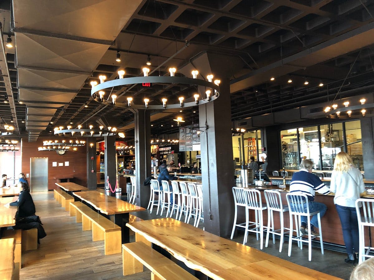 Half Beer Hall at Harpoon Brewery, modern event space with stylish bar for gatherings.