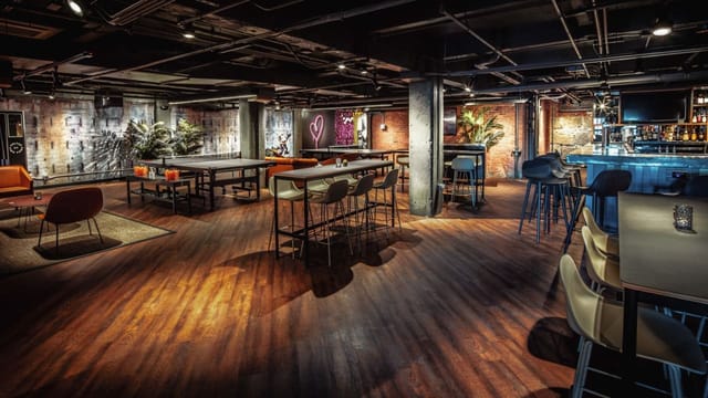 Dedicated ping pong tables in SPIN Boston's stylish event space for networking and gatherings.