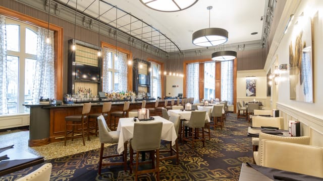 Private dining room at Ruth's Chris Steak House, elegant decor for events and meetings.