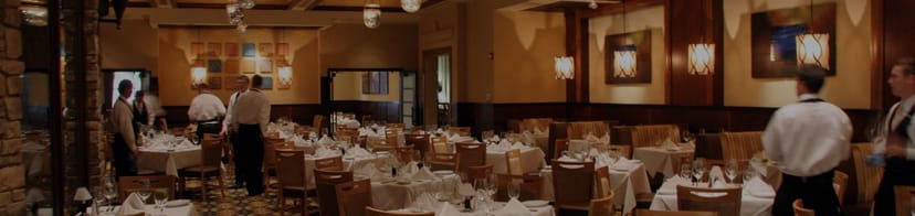 Private dining room at Ruth's Chris Steak House, elegant venue for formal dinners and events.