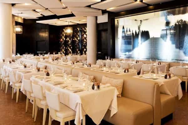 Private dining room at Sorellina with elegant table settings for corporate events.