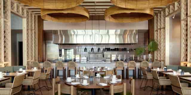 Modern banquet hall at Hotel Indigo, ideal for events and meetings with elegant decor.