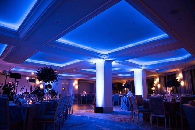 Harborview Ballroom with elegant blue lighting, ideal for upscale events and gatherings.