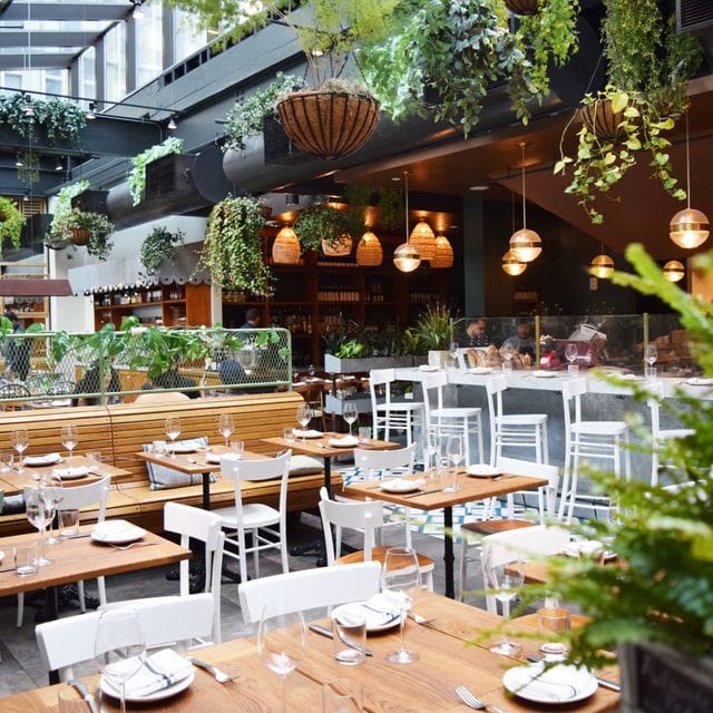 Private dining room at Eataly Boston, modern decor for corporate events and celebrations.