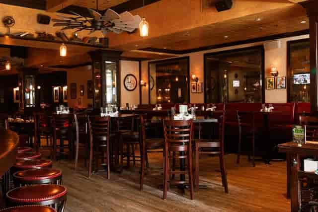 Private dining room at Back Bay Social, warm lighting, ideal for corporate events and gatherings.