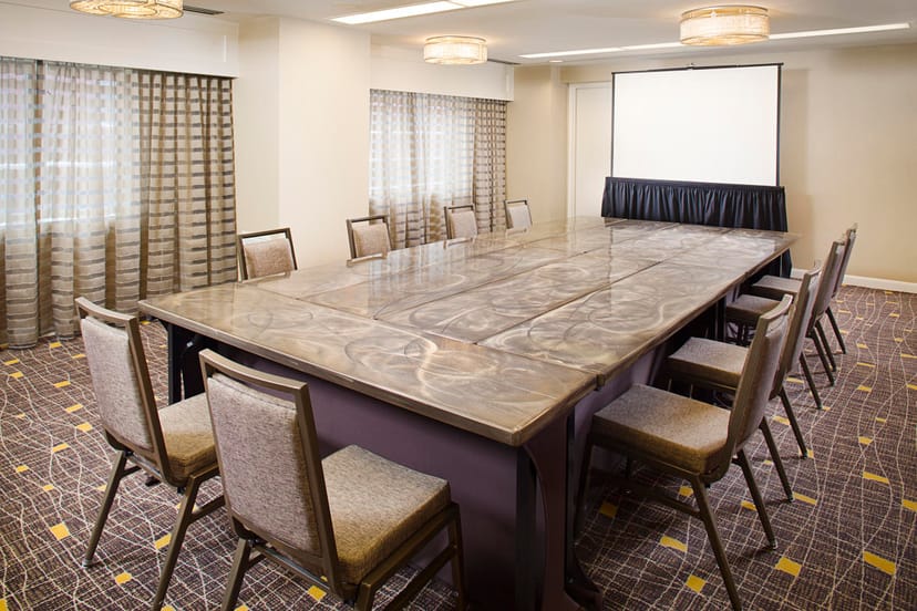 Modern meeting room at Hilton Boston Back Bay with elegant table for professional events.