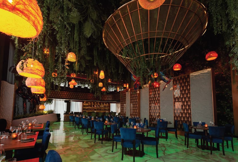 Vibrant La Selva Restaurant in Neera, perfect for events with lush greenery and stylish decor.