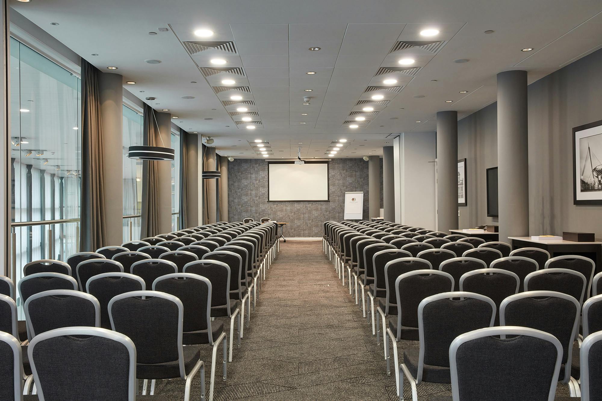 Modern conference room at DoubleTree Manchester, ideal for professional meetings.