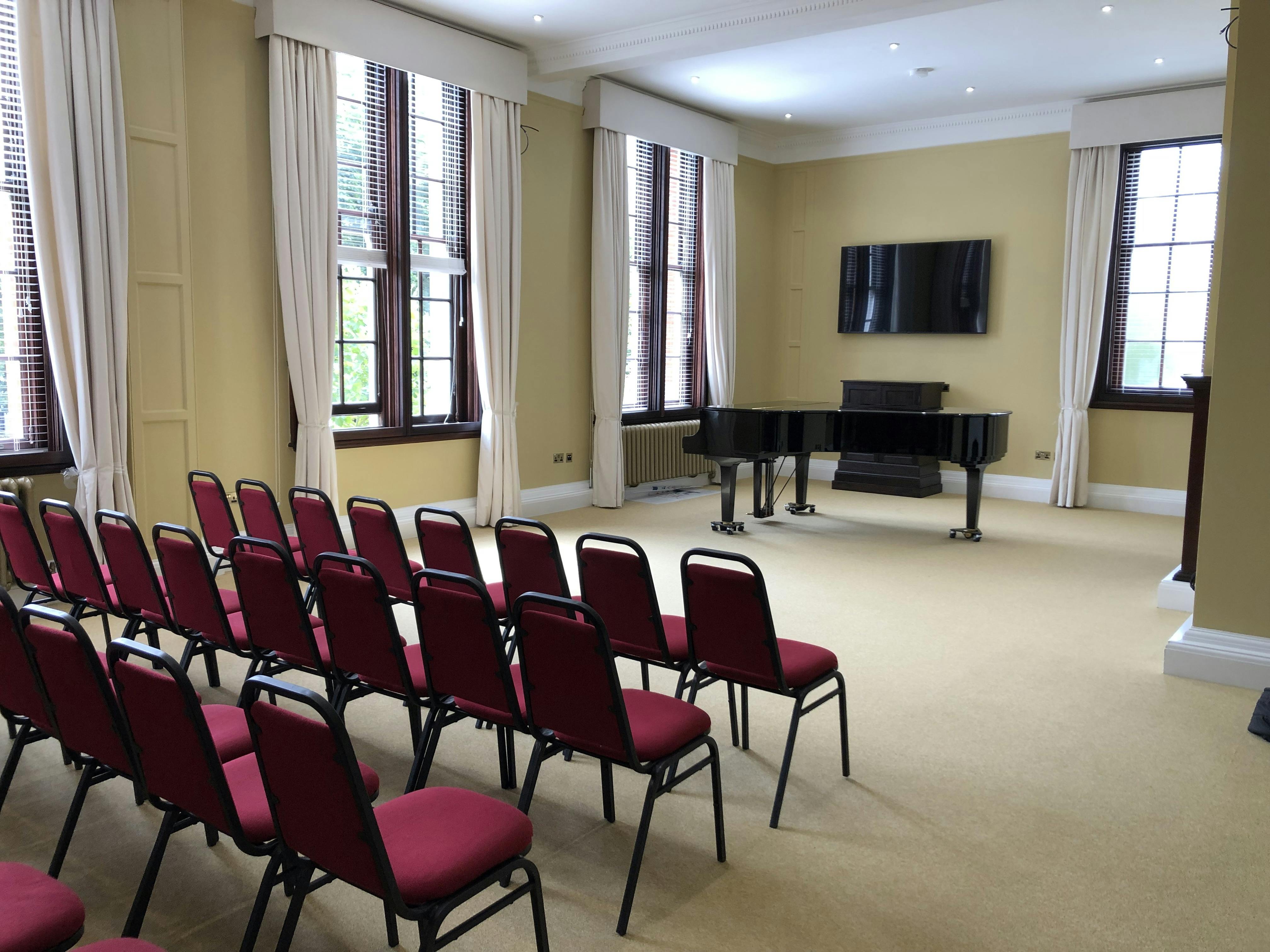 Forsyth Room at Royal Academy of Music with grand piano, ideal for workshops and concerts.