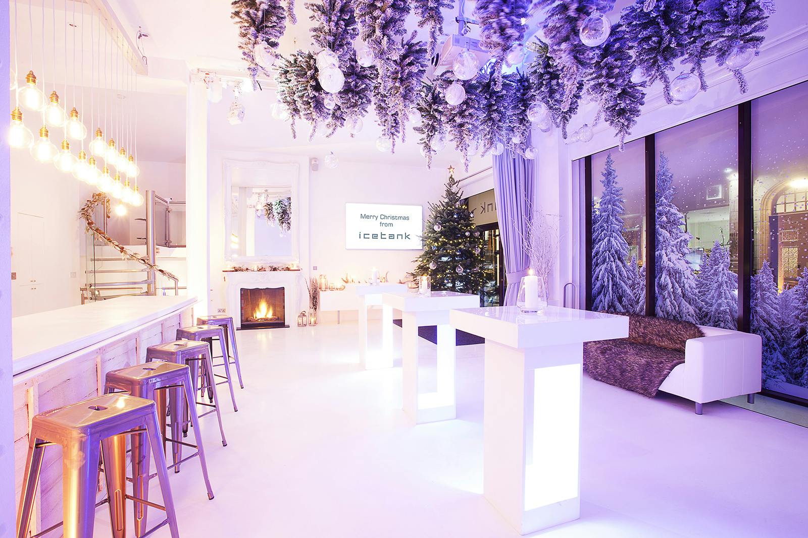 Stylish Christmas party venue with elegant decor and winter-themed ambiance.