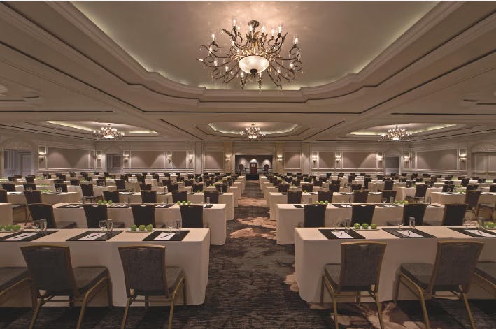 Ritz-Carlton Ballroom conference setup with elegant decor for workshops and presentations.