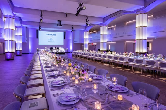 Elegant Hamilton Ballroom banquet hall with candlelit tables for corporate dinners and galas.