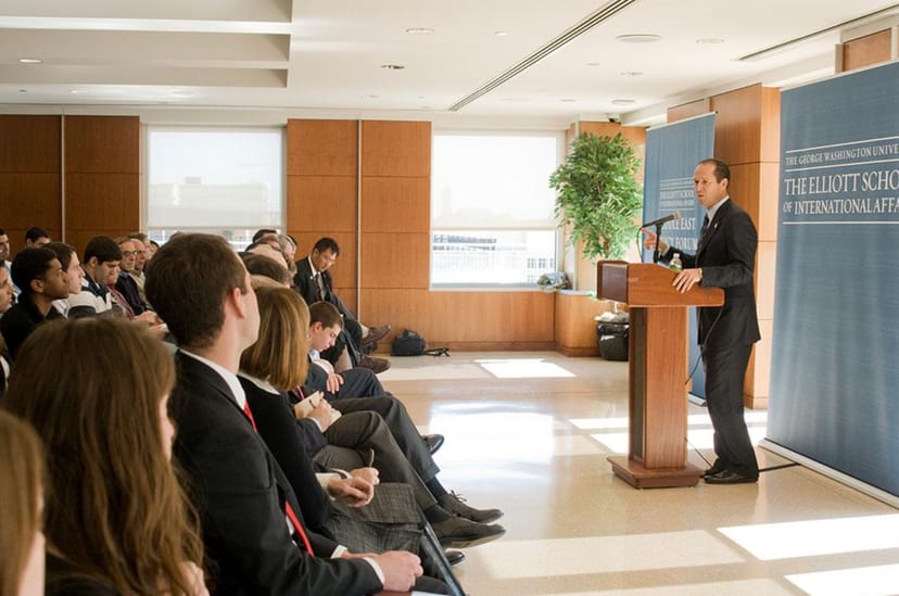 City View Room at GWU: modern conference with speaker and engaged audience, ideal for events.