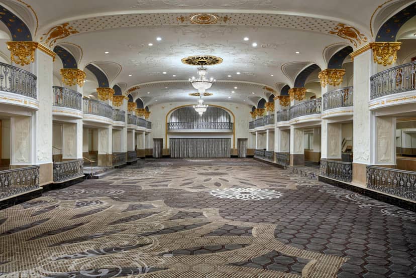 Grand Ballroom at The Mayflower Hotel with high ceilings, perfect for elegant events.