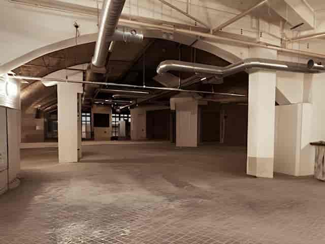 Spacious industrial venue with high ceilings for conferences and exhibitions at One America Square.