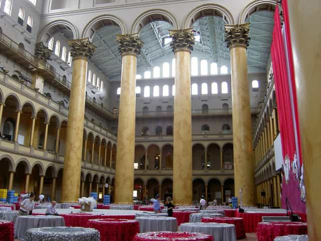 Auditorium in National Building Museum with tall columns, ideal for large events and exhibitions.