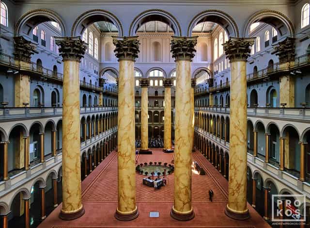Grand auditorium with marble columns, ideal for events and conferences at National Building Museum.
