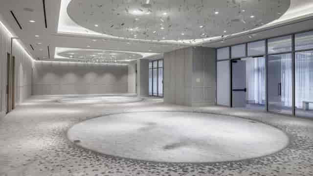 Armature Ballroom at The Morrow Hotel: modern event venue with elegant lighting for receptions.