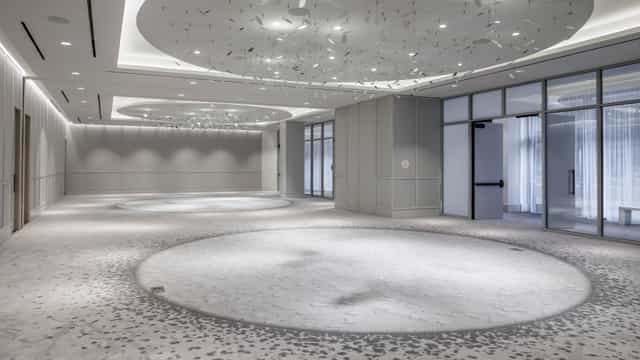 Armature Ballroom at The Morrow Hotel: modern event venue with elegant lighting for receptions.