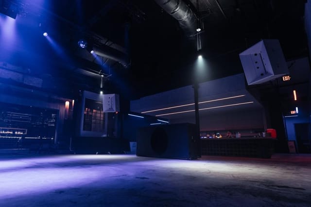 Versatile event space with modern lighting for corporate functions and private celebrations.