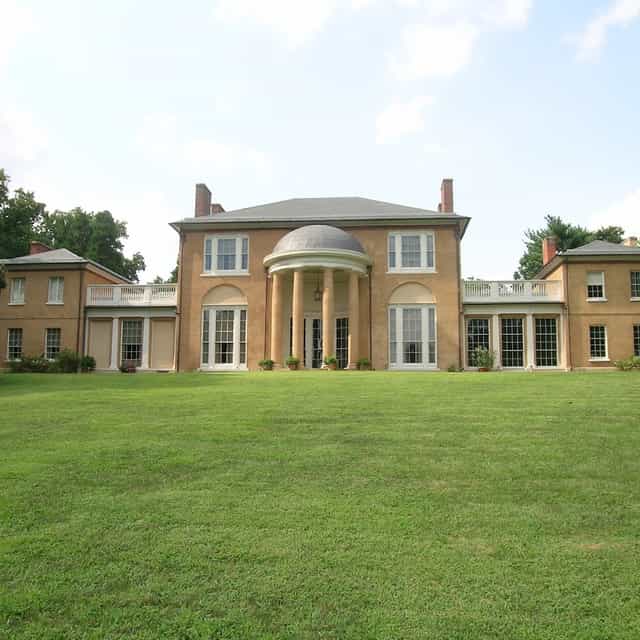 Elegant Tudor Place museum venue with grand entrance for upscale events and meetings.