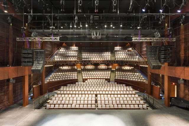 Harman Hall auditorium with tiered seating, ideal for performances and presentations.