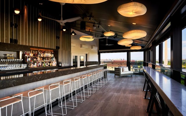 Stylish VUE Rooftop DC lounge with modern decor, ideal for networking events and cocktail receptions.