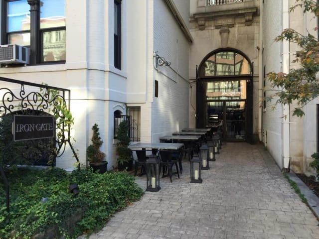 Charming Iron Gate Side Courtyard for intimate gatherings and cocktail receptions.
