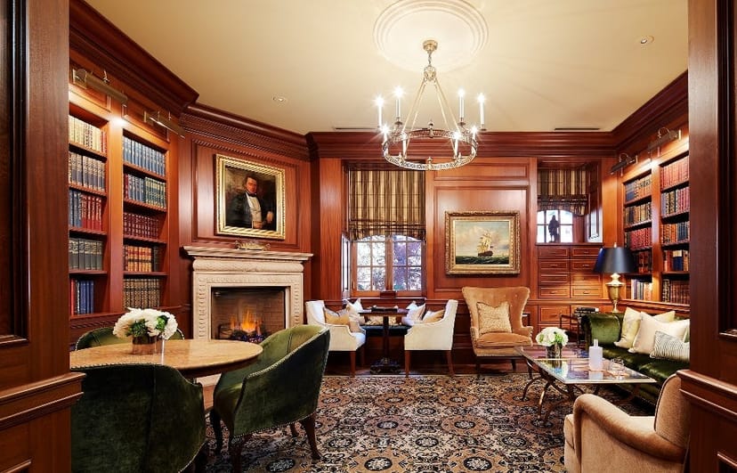 Elegant meeting space with wood paneling, ideal for executive meetings and gatherings.