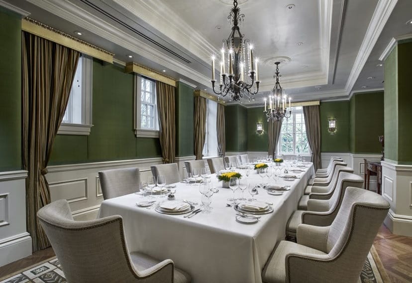 Elegant Parlor Boardroom at The Jefferson, DC, set for formal dining event with fine china.