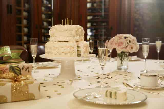 Elegant table with cake in The Jefferson's Private Wine Cellar for weddings and anniversaries.